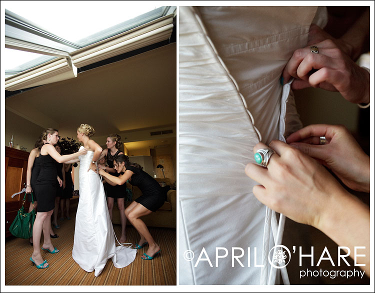 Amy getting some assistance from her lovely bridesmaids