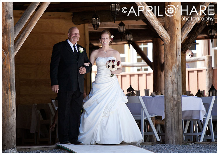 Bride walks down aisle with her dad Vail CO