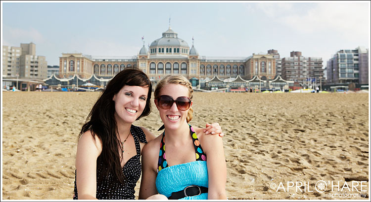 sisters sitting on the beach at the Hague