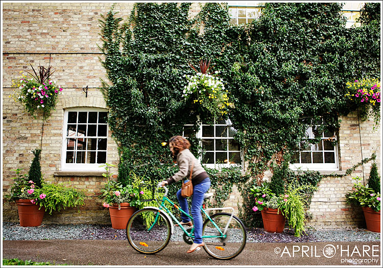Woman riding bike in Cambridge UK