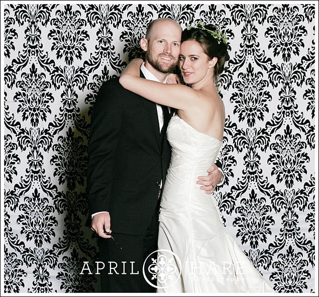 Wedding Photobooth with a Black and White Damask Backdrop