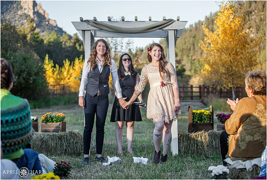 Colorado lesbian wedding in a fall color mountain meadow