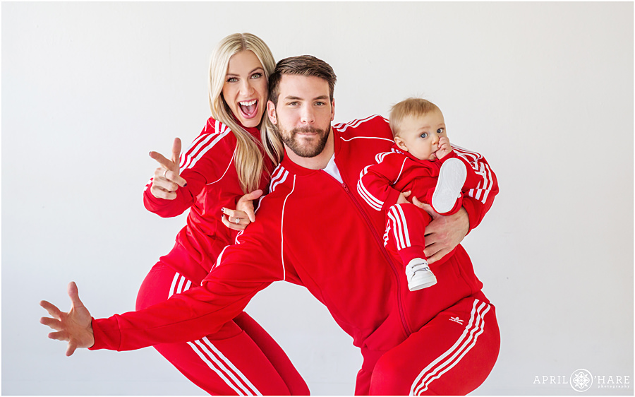 Red Adidas Tracksuits on a family of 3 at Denver Indoor Studio Photos