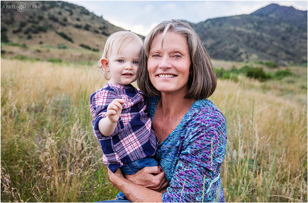 Grandma with her one year old baby granddaughter at a Colorado Family Photo Session at Mount Falcon