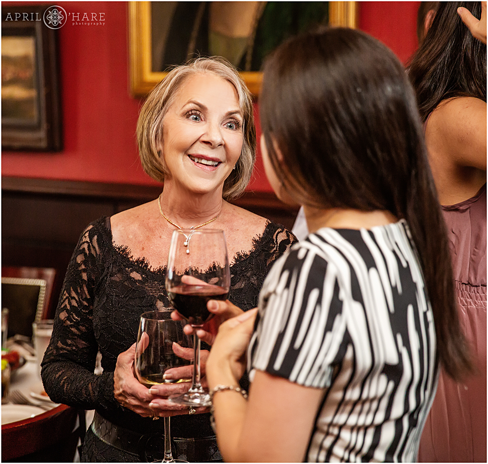 Candid birthday party event photography at City Grille in Larimer Square