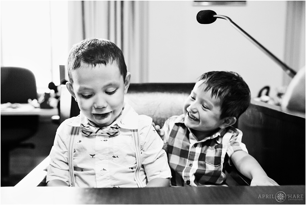 Sweet little boys play in the court room at an adoption proceeding in Greeley