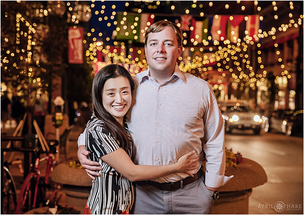 Couples portrait in front of the pretty string lights at Larimer Square in Denver CO