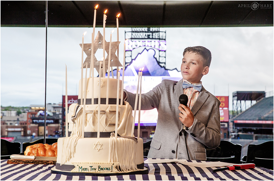 Jewish candle lighting ceremony for a baseball themed bar mitzvah at Coors Field
