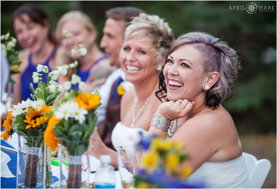 Two happy brides at their beautiful Backyard Lesbian Wedding in the mountains of Colorado