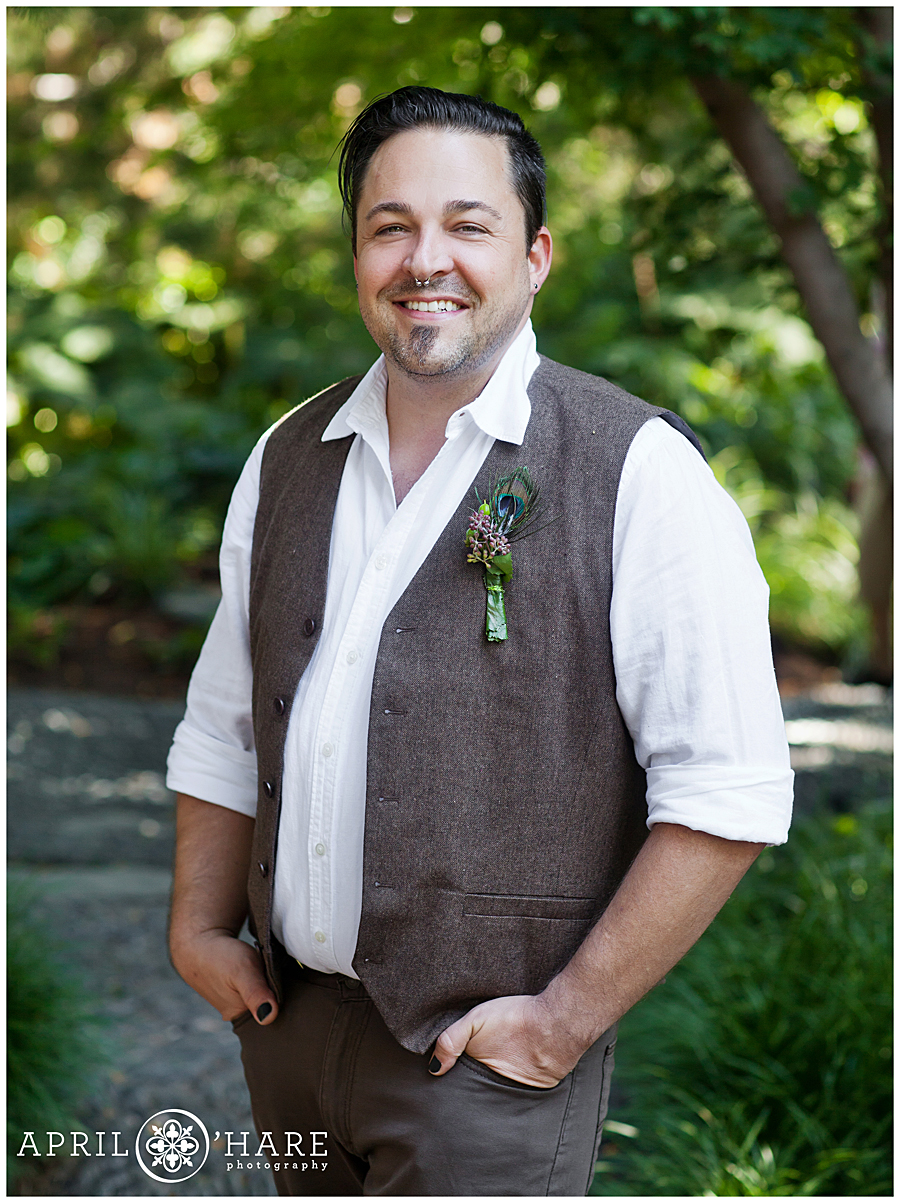 Groom wearing a casual look with vest at his Denver bohemian wedding in Colorado