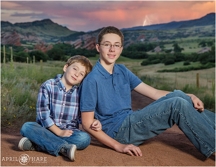 South Valley Park Family Photos with two brothers and lightning in the backdrop
