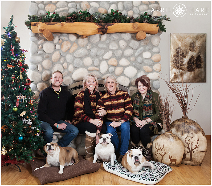 Stone fireplace Winter Steamboat Springs Family Photos with 3 dogs