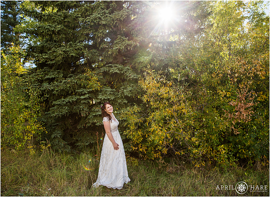 Beautiful bride photo in the fall color at her Colorado Boho Wedding