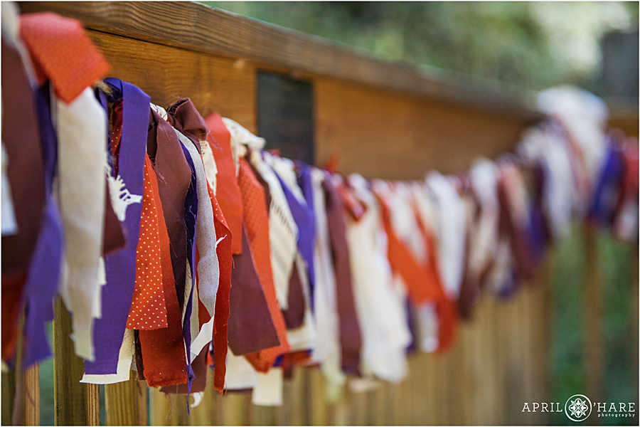 Handmade ribbon garland for a fall color Colorado Boho Wedding