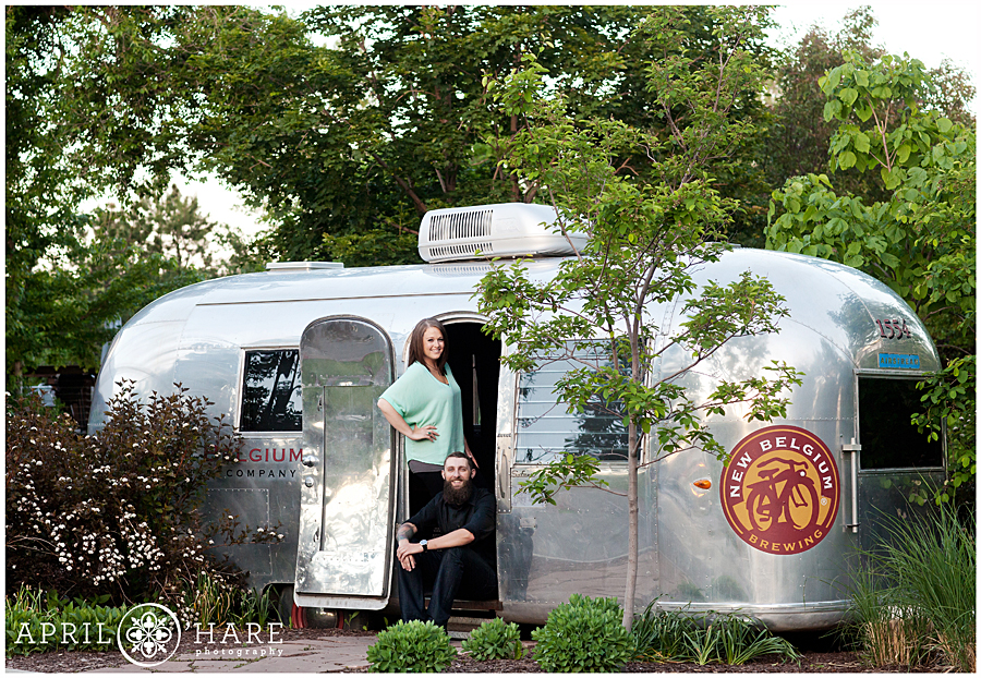 Cute New Belgium Airstream Engagement Picture at a brewery engagement photosession