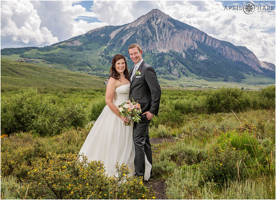 Classic wedding portrait with Crested Butte mountain backdrop from a Crested Butte wedding photographer