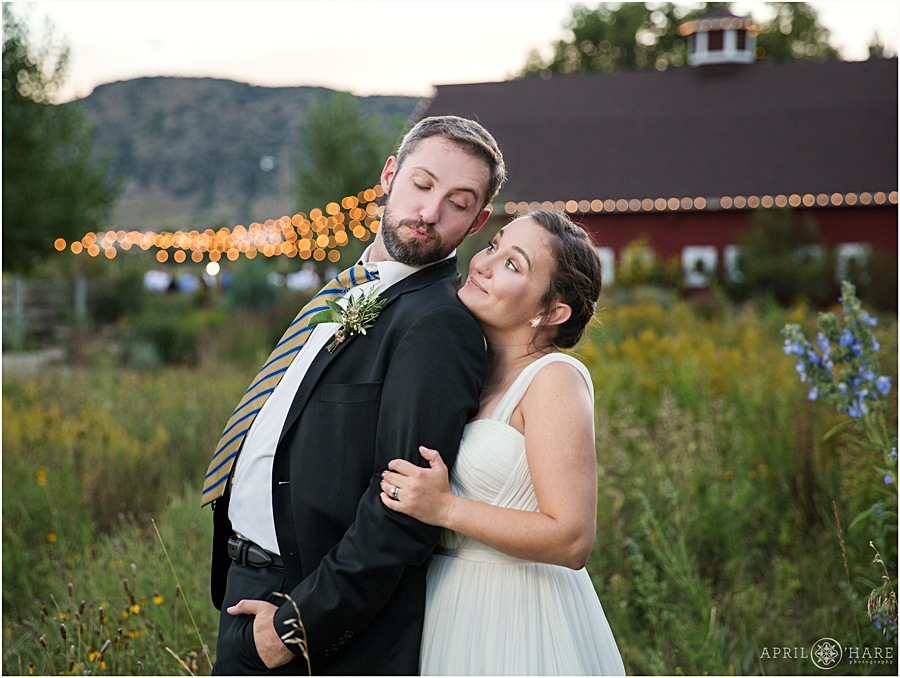 Cute Silly Wedding Photo at Rustic Colorado Wedding Venue at Red Barn at Chatfield Farms