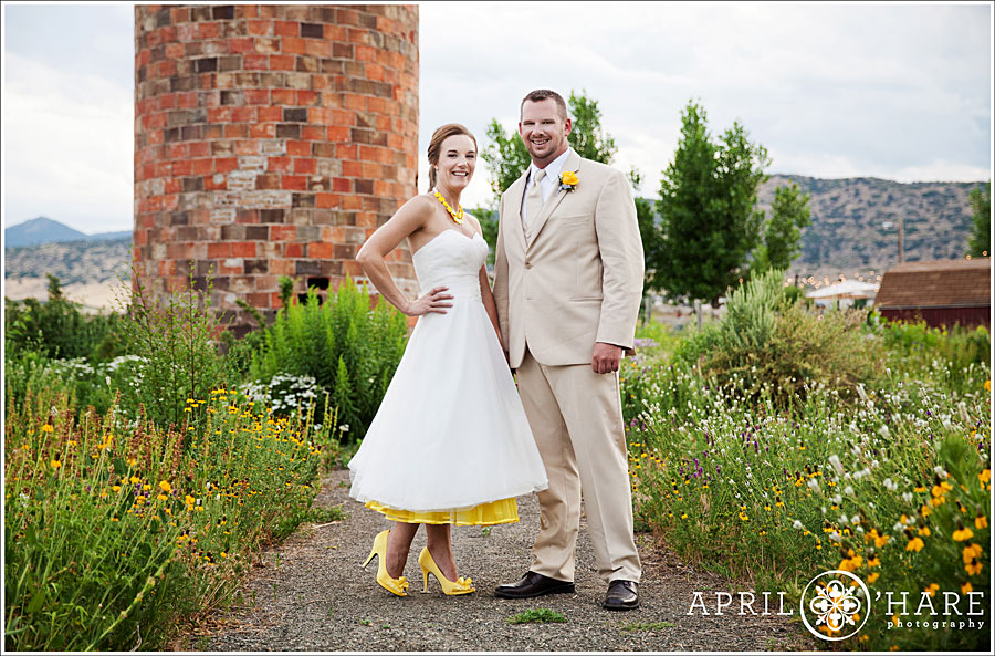 Cute couple wearing yellow accents for their yellow themed wedding in CO