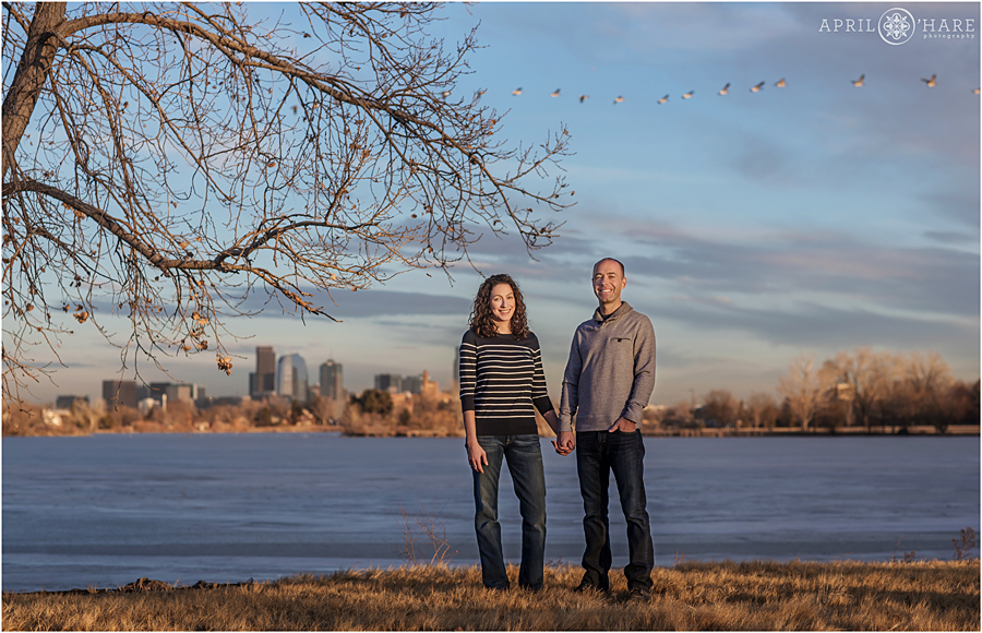 Denver Winter Engagement Photography with Denver Skyline view at Sloans Lake