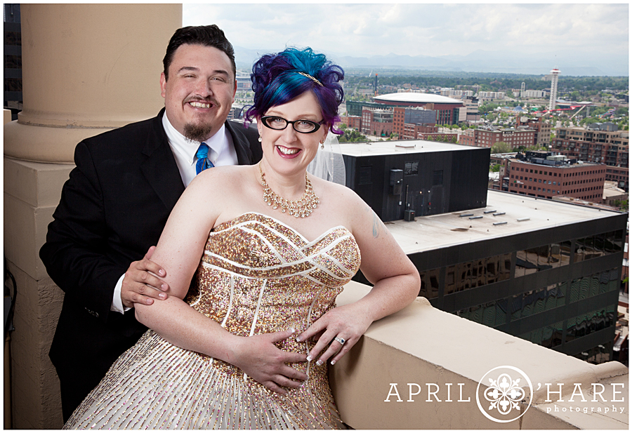 Colorful bride with bright blue hair and glitter wedding dress in Denver