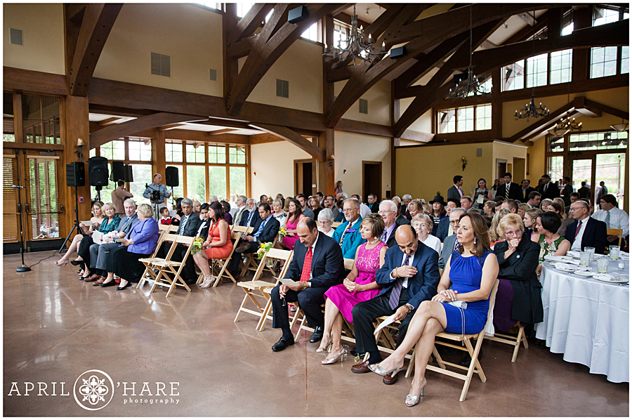 Wedding guests seated at indoor Vail wedding