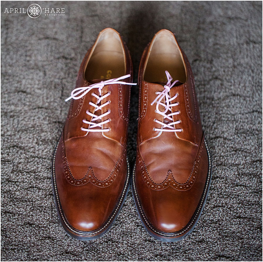 Groom's shoes have pale pink shoelaces to go with the Pale Pink Wedding theme