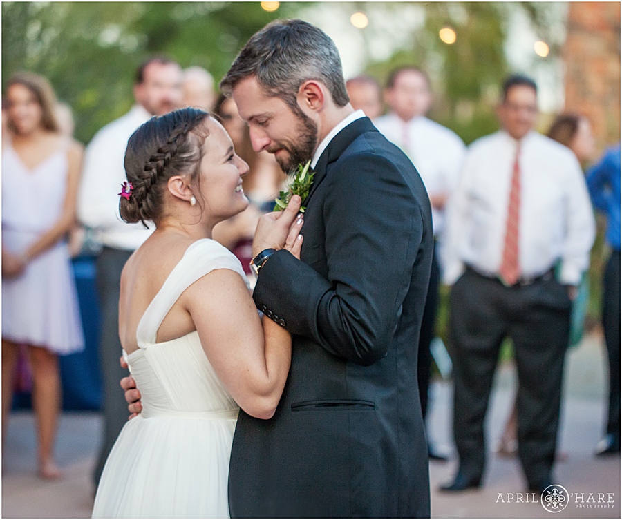 Sweet Wedding Moment First Dance on Patio at Rustic Colorado Wedding Venue Chatfield Farms