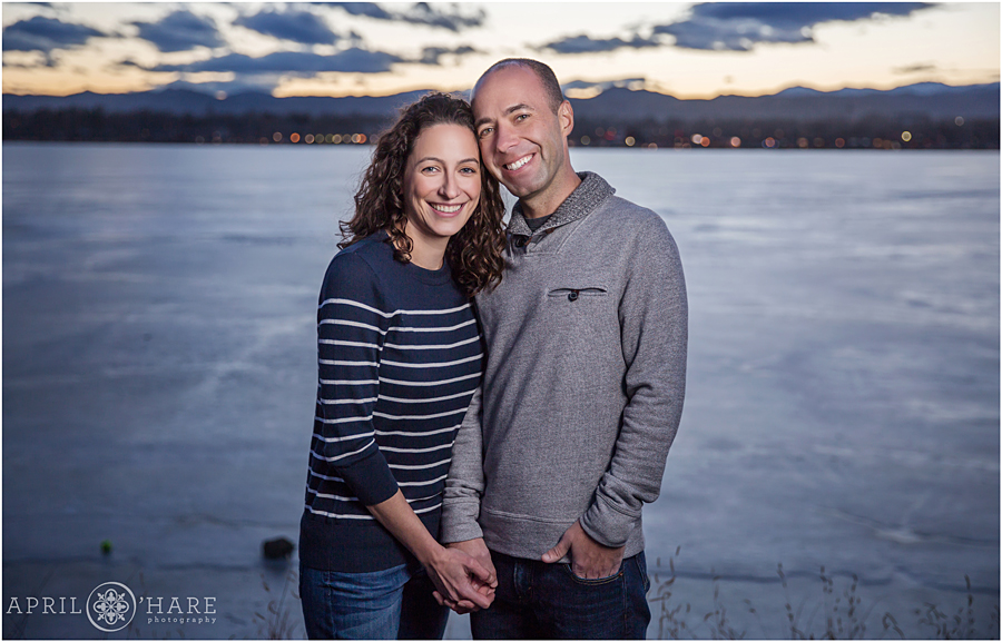 Denver Winter Engagement Photography with frozen Sloans Lake and Mountain Backdrop