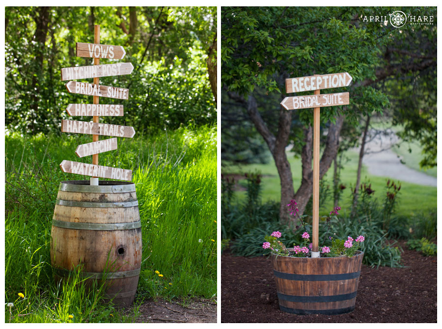 Handpainted rustic wood wedding signs at a Denver Garden Wedding in Littleton CO Chatfield Farms