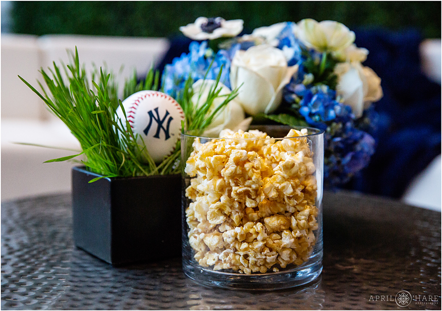 Popcorn with Yankees baseball themed bar mitzvah with blue and white florals at Coors Field