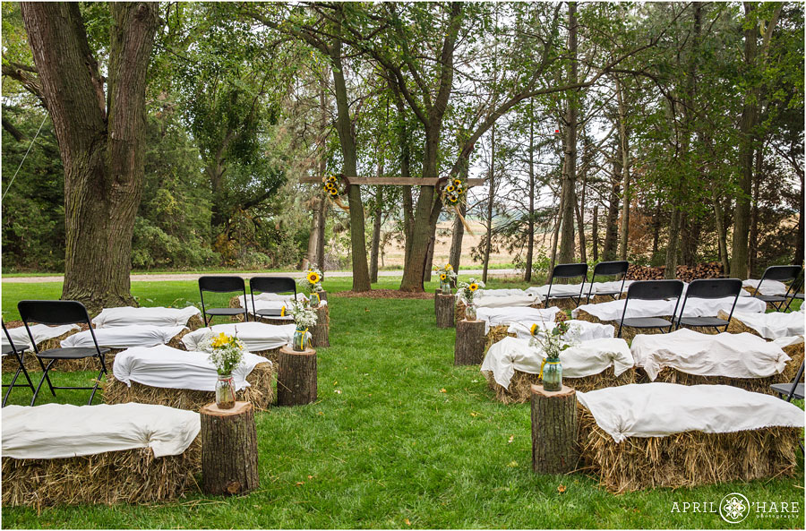 Wedding ceremony with haybale seating at a real Nebraska Farm Wedding