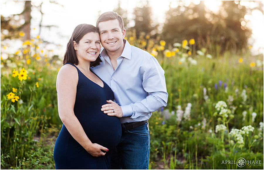 Steamboat Springs Maternity Photography in the summer wildflowers at Dumont Lake