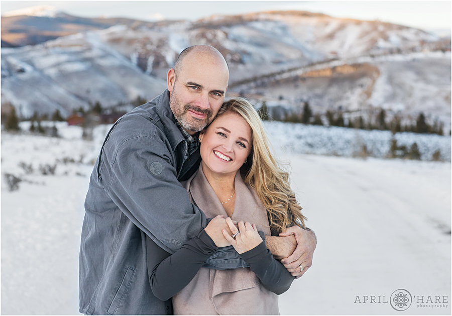Adorable couple in the snow Family Photos at C Lazy U Ranch