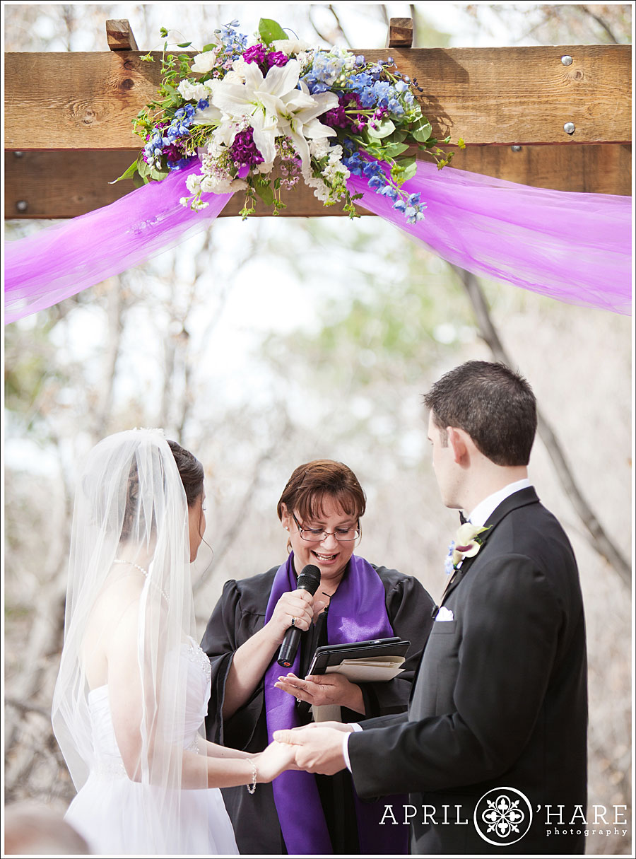 Bride and groom enjoy their ceremony before a Wild Bear Crashes Colorado Wedding