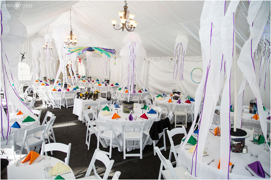 Boulder Gay Wedding Reception Tent full of white with Rainbow Accents