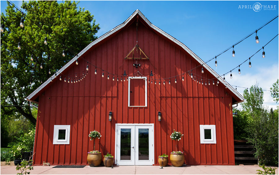 Bright red rustic barn wedding venue at a Denver Garden Wedding in Colorado