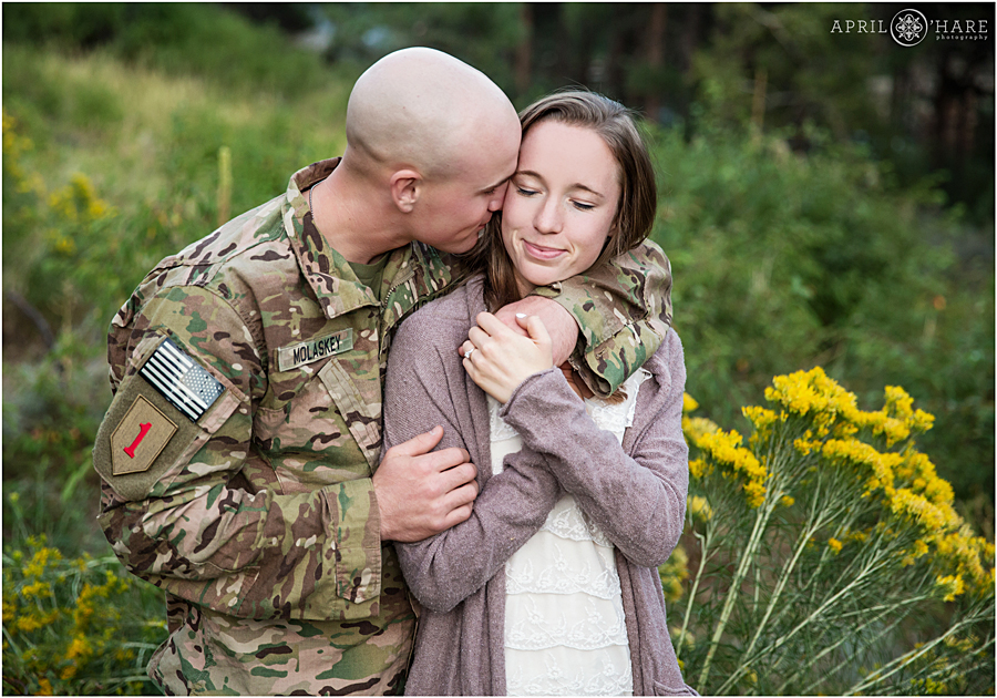 Romantic soldier kisses his bride to be at their Fort Collins Engagement Photography session