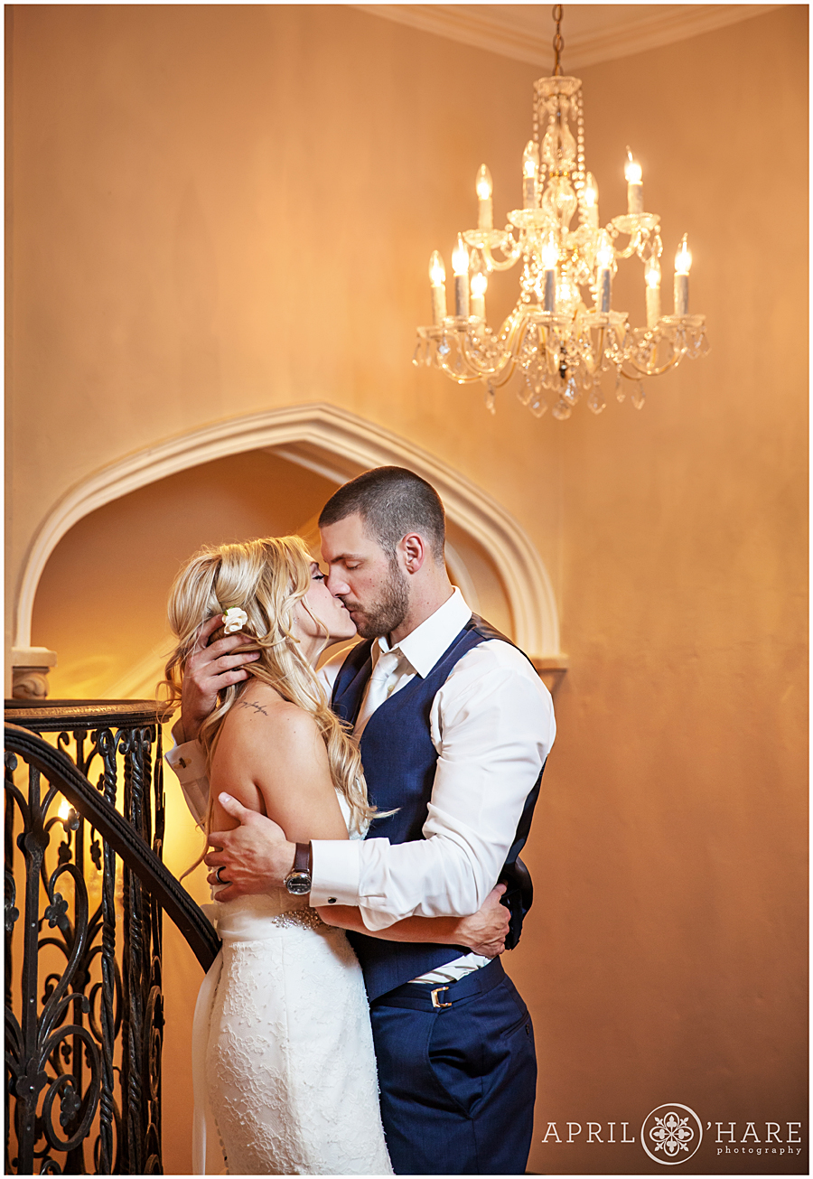 Romantic indoor wedding photo at a Denver winter mansion wedding