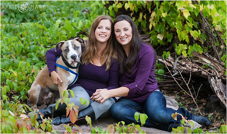 Colorado LGBTQ Family Photos Two Lesbian Moms with their Pit Bull Puppy at Chatfield State Park