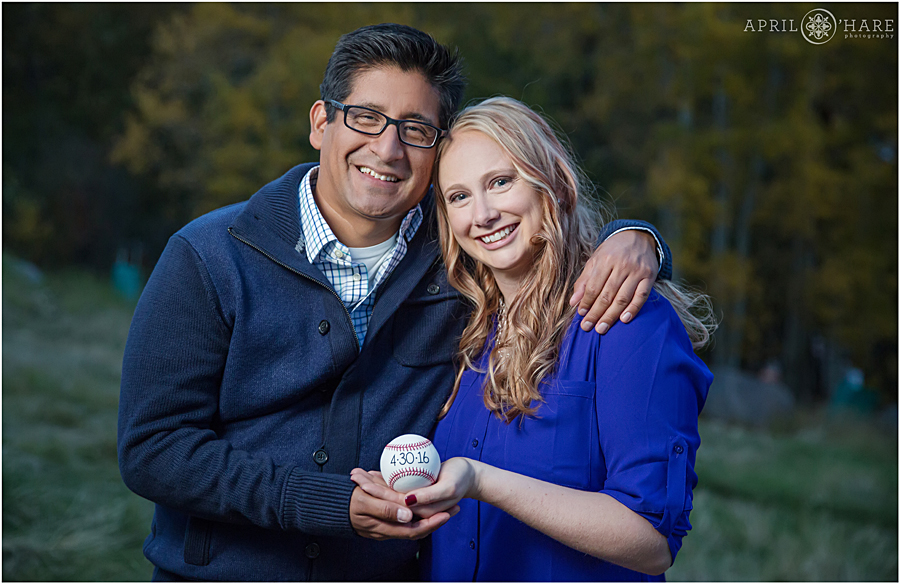 Baseball lovers at their fall color Beaver Creek engagement session in Colorado