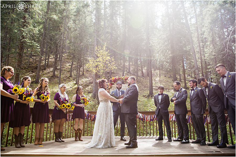 Pretty Colorado Boho Wedding Ceremony in the woods