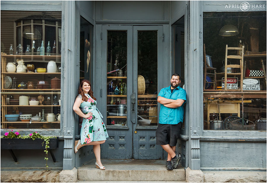 Cute Georgetown Engagement Photos with a pretty historic storefront in Colorado