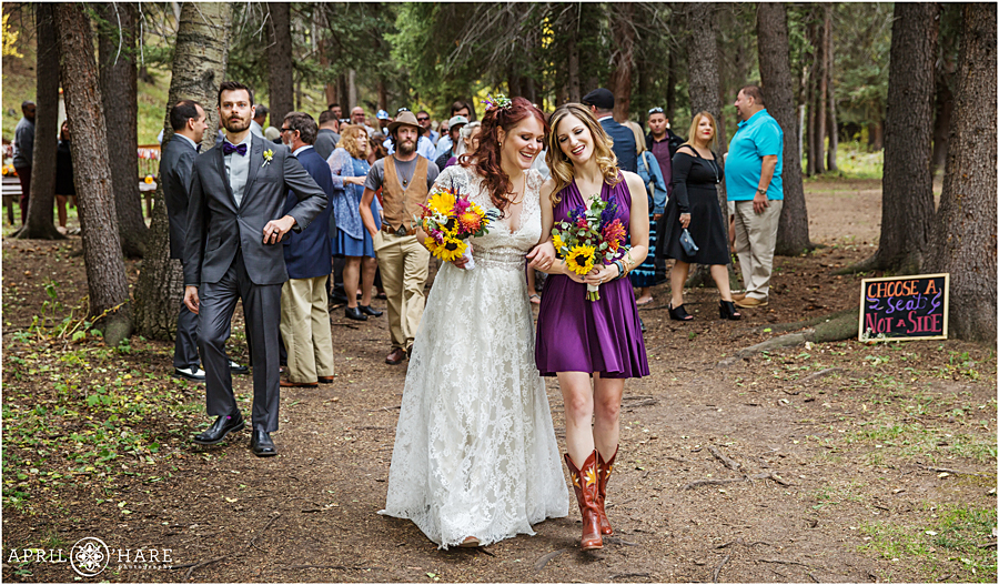 Fall wedding with purple and sunflower yellow florals for a Colorado Boho Wedding
