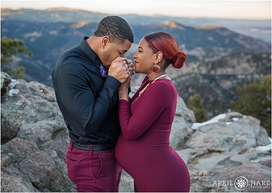 Sweet photo of an expecting couple at their pregnancy photography session at Lost Gulch Overlook created by a Boulder Maternity Photographer