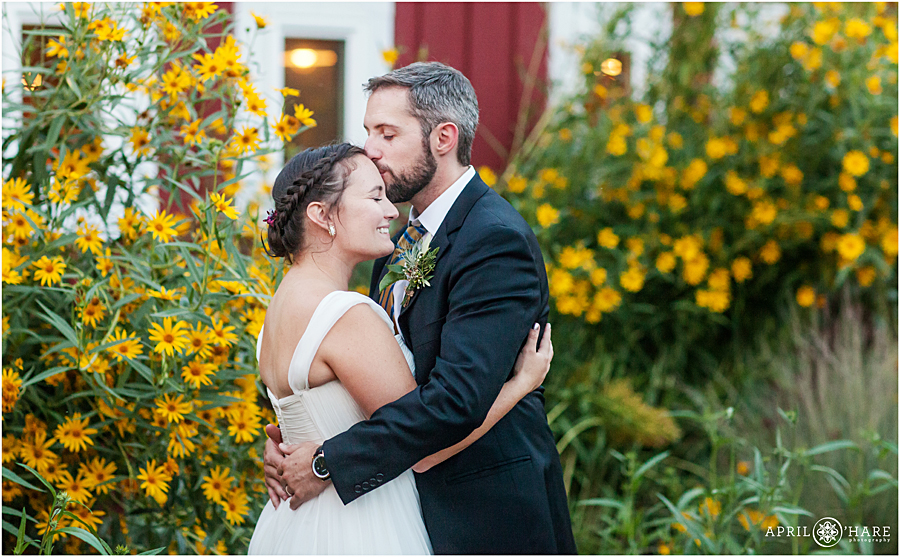 Romantic Colorado Wedding Portrait with Yellow Sunflowers at Rustic Barn Wedding Venue Chatfield Farms 