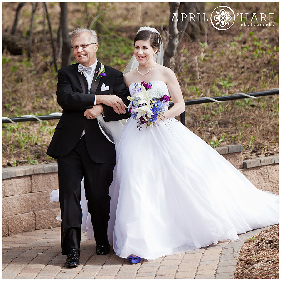 Before a Wild Bear Crashes Colorado Wedding, bride's dad walks her down aisle