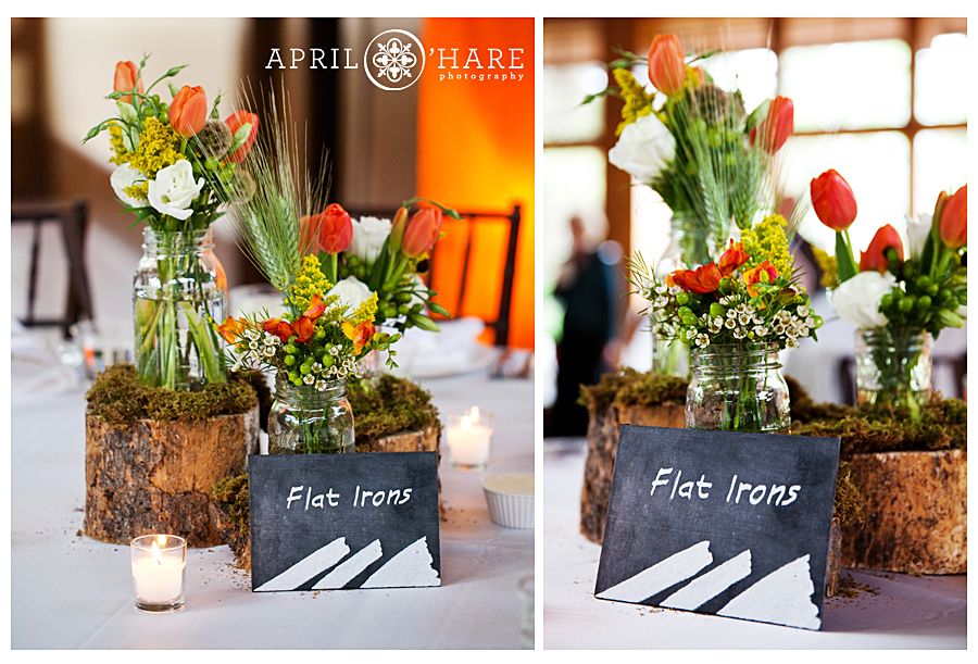 Warm colored florals for indoor vail wedding table centerpieces
