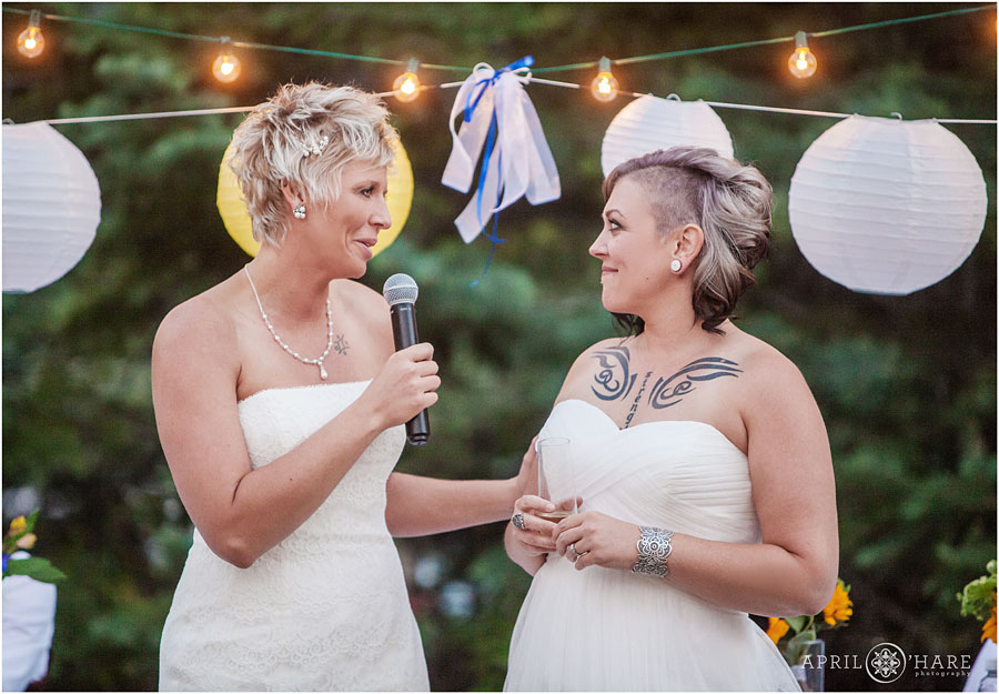 Backyard Lesbian Wedding with paper lanterns and string lights