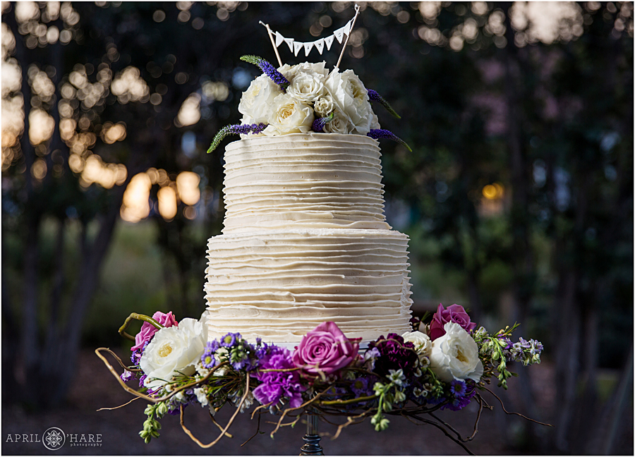 Prettiest photo of a wedding cake ever at Deer Creek Stables at Chatfield Farms in Colorado