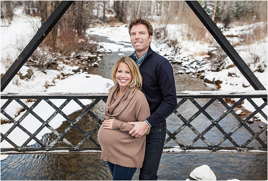 Pretty Snowy Aspen Maternity Photos with the Ron Krajian Bridge and Roaring Fork River in the backdrop